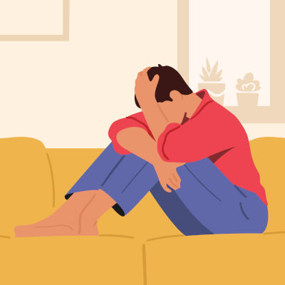 Frutrated father with head in hands due to frustration