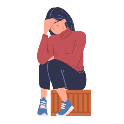 Mother holding head in hand due to stress
